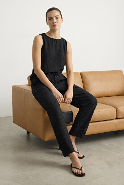 Trendyol Collection Schwarze ärmellose Bluse und elastische Taille, weites Be...