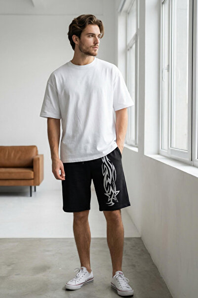 Trendyol Collection Černé oversize/široký střih potištěné šortky a bermudy TMNSS25SR00050