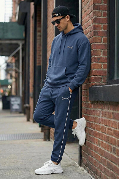 Trendyol Collection Übergroßes Fleece-Trainingsanzug-Set mit Kapuze und Indigo-Stickerei – TMNAW24EM00000