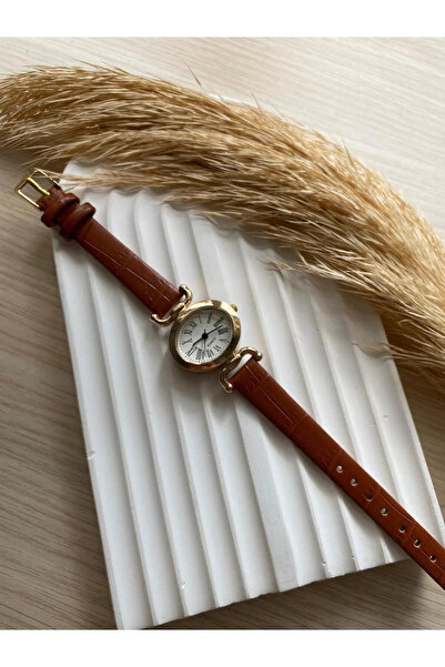 QUARTZ ساعة يد نسائية ذات لون بني داكن طراز عتيق بتصميم بسيط