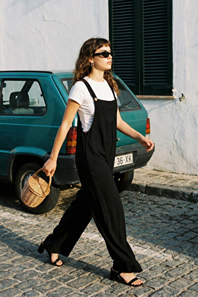 Trendyol Collection Schwarzer Gilet-Overall in Leinenoptik mit weitem Bein un...