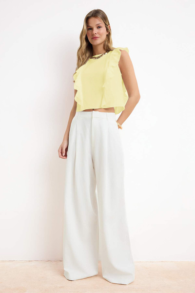 Trendyol Collection Gelbe, halbtransparente, gewebte Bluse mit Rüschendetails...