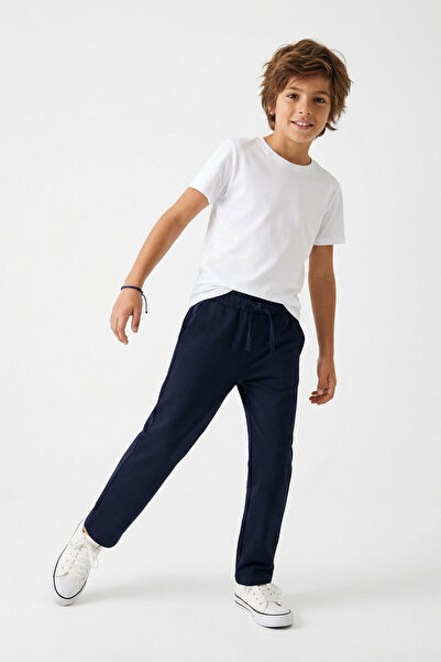 TRENDYOLKIDS Marineblaue flach gewebte Hose für Jungen TKDSS26PL00006