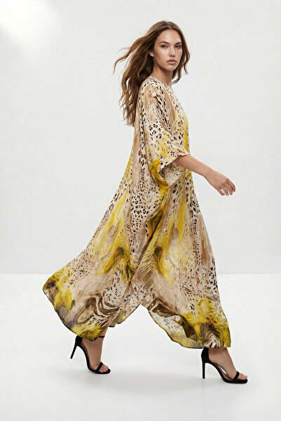 Trendyol Modest فستان كافتان استوائي بدون بطانة بنمط حيواني باللون البيج TCTS...