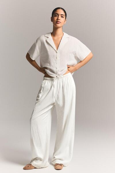 Bershka Beli lastikli keten görünümlü pantolon