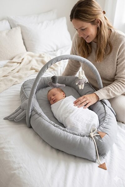 Babynest Baby Bed with Angel Wings -gray, my first Bed, Baby Nest with Toy Bar