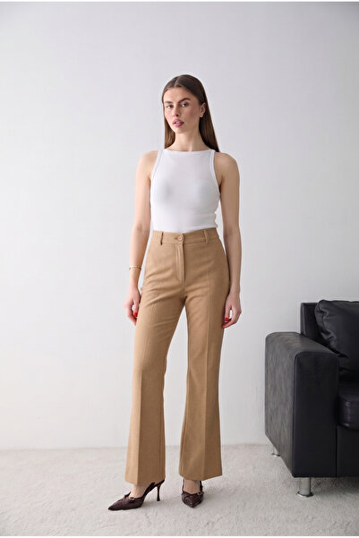 Trendyol Collection Pantaloni țesuți bej evazați TWOSS26PL00232