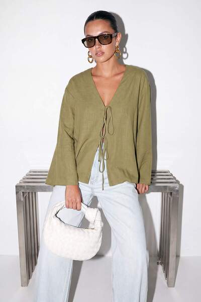 Drop by TrendyolMilla Khaki V-Neck Front Tie Standard Size Wide Sleeve Blouse...