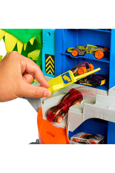 HOT WHEELS City Ultimate T-Rex Garajı, 2 oyuncak araba ve 50'den fazla araç için saklama alanı JHL98