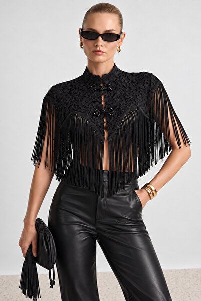 Trendyol Collection بلوزة سوداء مسطحة غير متماثلة بدون أكمام مزينة بالترتر TP...