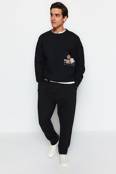 Trendyol Collection Černá sada pleteného pyžama s potiskem Regular Fit TMNAW24PT00045