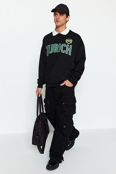 Trendyol Collection Μαύρο μπλουζάκι ζεστό oversize εμπριμέ - TMNAW24SW00187