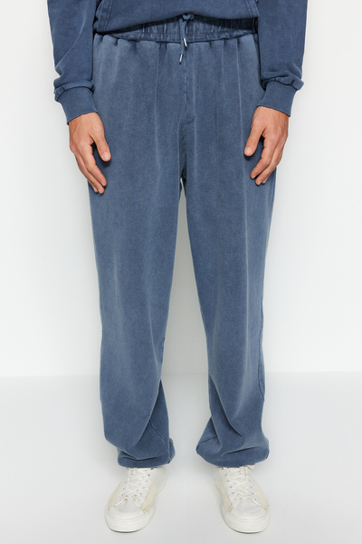 Trendyol Collection Indigo Limited Edition Oversize mosóhatású 100% pamut nyitott lábú melegítőnadrág TMNAW24EA00002