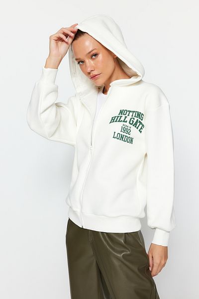Trendyol Collection Ecru zadní potištěná mikina na zip s kapucí silná vnitřní fleece oversize fit pletená mikina TWOAW24SW00391