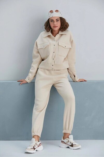 LoFiBuy Kadın Krem Cepli Paçası Lastikli 3 İplik Eşofman Takımı