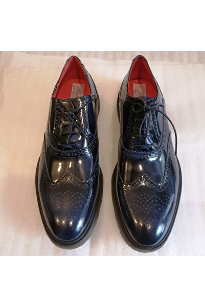 Butik Tülin Unisex hakiki deri açma lacivert parlak zımba delikli ağır siliko...