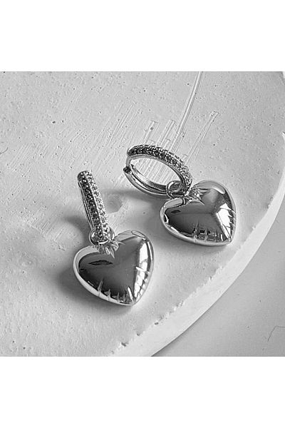 neslyaccessories أقراط قلب منحنية بتصميم حجر الزركون