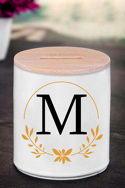yhfoto Κουμπαράς με γράμμα M (ΚΕΡΑΜΙΚΟ) - Crown M - K138