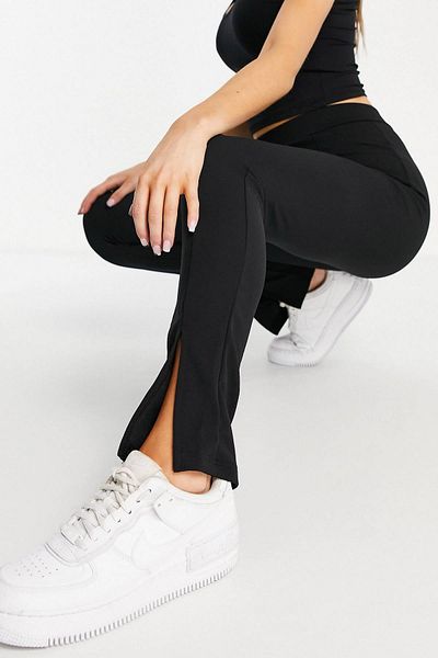 World Fashion Trends wft1556 Pantaloni negri cu talie elastică cu detaliu cu fante pe picior