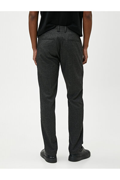 Koton Základní plisované kalhoty s detailem na knoflíky a kapsami