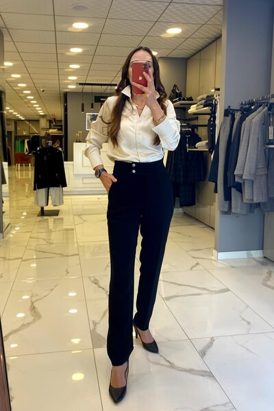 Vosse بنطال ذو أرجل ضيقة مزين بأزرار سوداء من Ekol