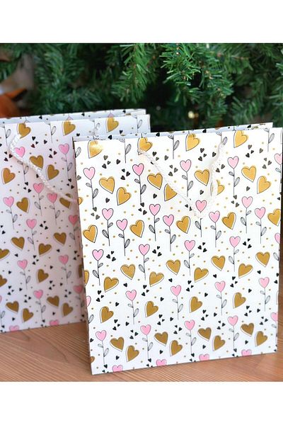 QUEEN AKSESUAR Imported luxury shiny gold metallic heart flower pattern gift package hard cardboard bag with drawstring