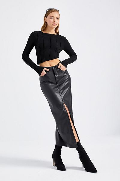 its basic Women's Black Color Maxi Length Faux Leather Skirt with Raised Slit Inside