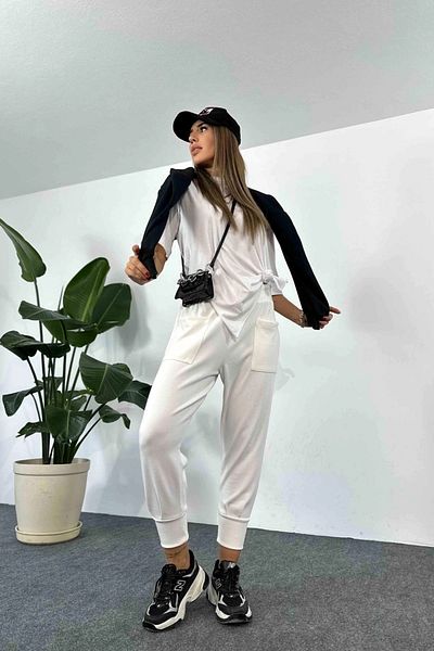BEBE PLUS Women's Pocket Detailed Knitted Trousers