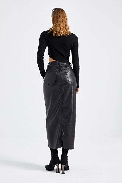 its basic Women's Black Color Maxi Length Faux Leather Skirt with Raised Slit Inside