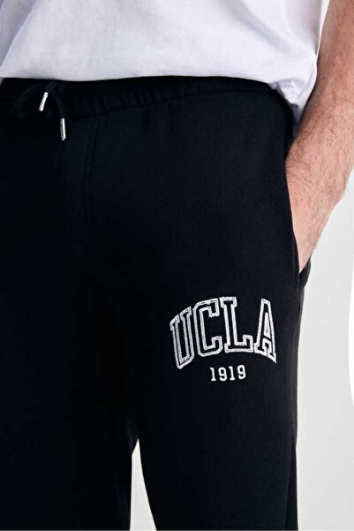 UCLA Ανδρική φόρμα αθλητικής φόρμας OTTO Μαύρο άνετο κέντημα στα πόδια Standard Fit