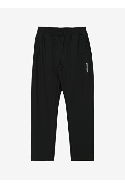 Discovery Expedition Siyah Kadın Lastikli Paça Standart Fit Outdoor Pantolonu...
