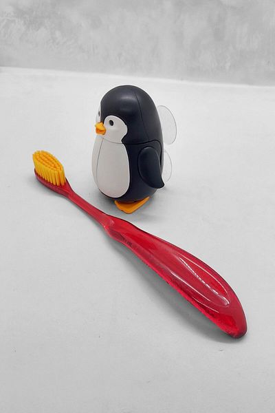 R.O.C.S. Junior 6-12 Toothbrush Red and Flipper Hygienic Storage Container Set - Penguin