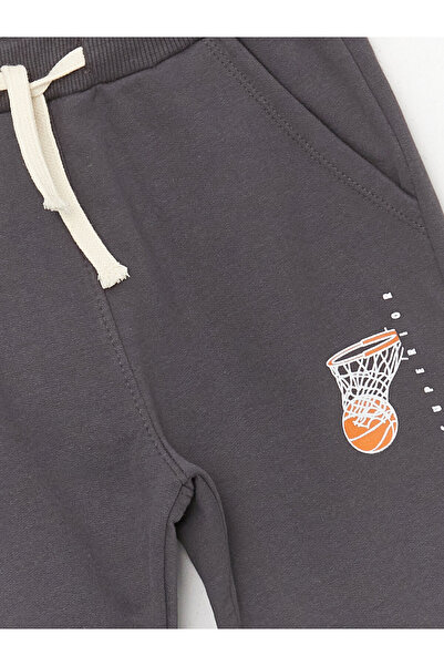 LC Waikiki Chłopięce spodnie dresowe typu jogger – elastyczny pas i nadruk