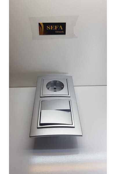 ELBİ سلسلة Zena Silverline - جهاز تبديل باللون الرمادي المعدني مع إطار مقبس مؤرض