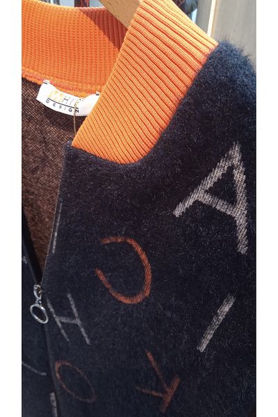 Whip Design Collar and Sleeve Part Orange Color Feather Textured Black Jacket