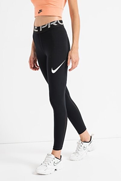 Nike Antrenman için yüksek bel taytlar, file parçalar ve Dri-Fit teknolojisi