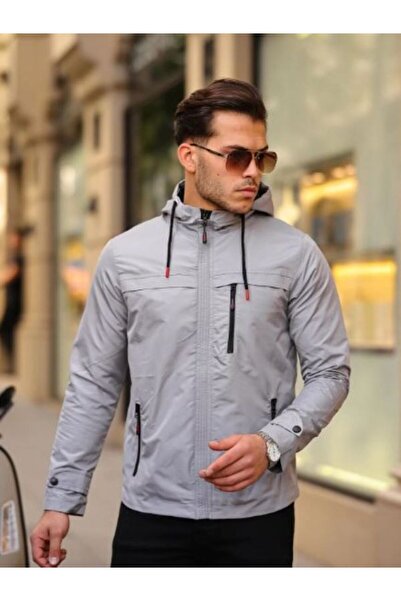 Clavi معطف موسمي بغطاء رأس ومقاوم للماء مع تفاصيل مشبكة من النشا