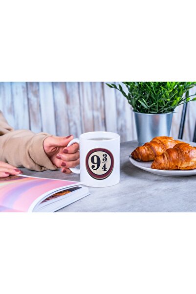 Veintitres كوب بطبعة هاري بوتر 9 3/4