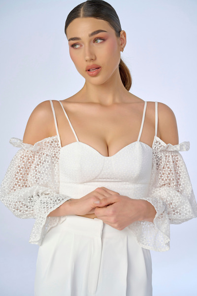 niyama KOL BÜZGÜ DETAYLI BLUZ