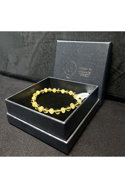 Amber by Mazukna Flexible and Free Cut Milk Colored Drop Amber Bracelet - Youth and Adult Certified