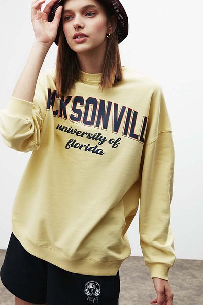 GRIMELANGE Ramona Damen-Sweatshirt aus weicher Fleece-Innenseite aus Bio-Baumwolle mit bedrucktem Rundhalsausschnitt