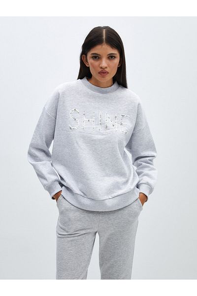 LC Waikiki Langärmliges, übergroßes Damen-Sweatshirt mit Rundhalsausschnitt – bedruckt