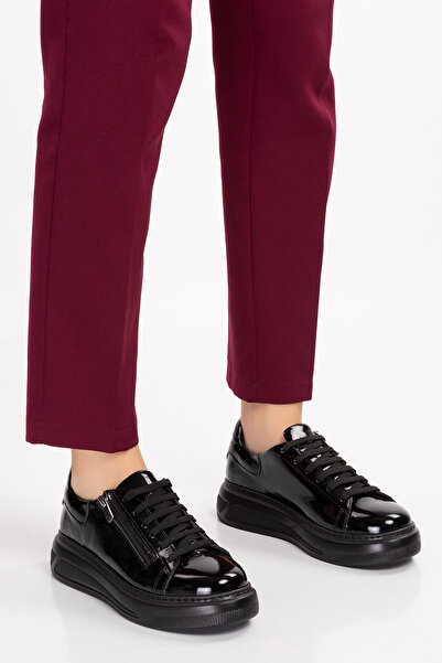 Dağlı حذاء رياضي نسائي من الجلد الأسود اللامع مزود بسحاب