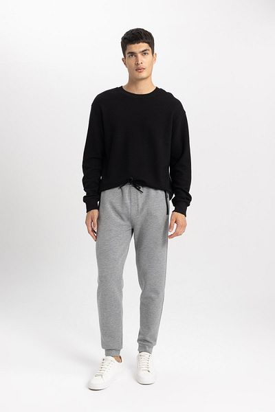 DeFacto Slim-Fit-Jogginghose – Basic Slim-Fit, Schnür-Taille, elastisches Bein und Reißverschlusstasche