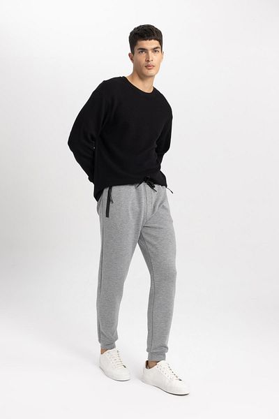DeFacto Slim-Fit-Jogginghose – Basic Slim-Fit, Schnür-Taille, elastisches Bein und Reißverschlusstasche