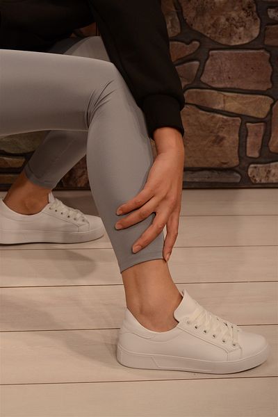 Isy White Skin Bound Woman