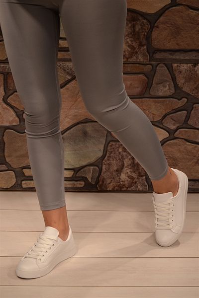 Isy White Skin Bound Woman