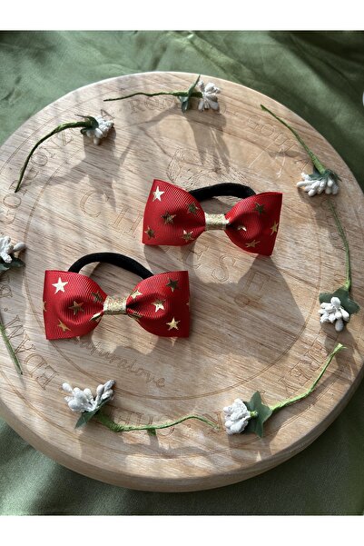 MeloKids طقم مشبك مطاطي مكون من قطعتين باللون الأحمر مع طباعة نجوم