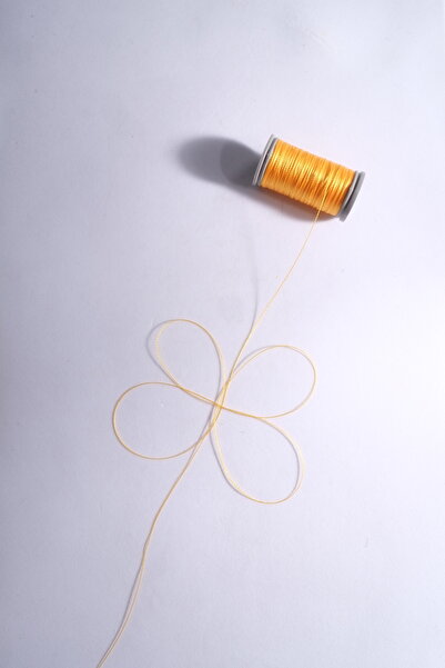 Eskişehir hobi sanat حبل مسبحة 0.2 مم 30 متر لون أصفر كهرماني (أرق حبل مسبحة)