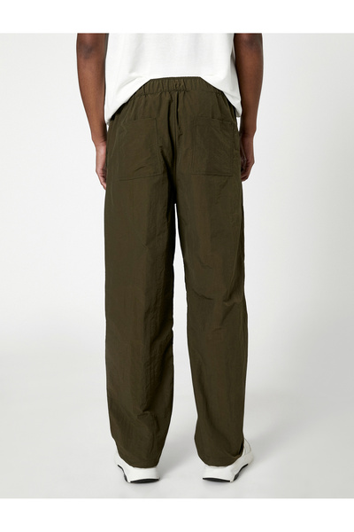 Koton Paraşüt Pantolon Bol Kesim Beli Bağcıklı Paçası Lastikli Cep Detaylı